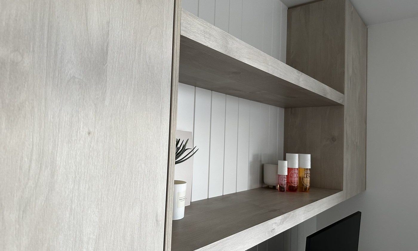 Timber veneer shelving with white panel back — coastal Hamptons kitchen detail