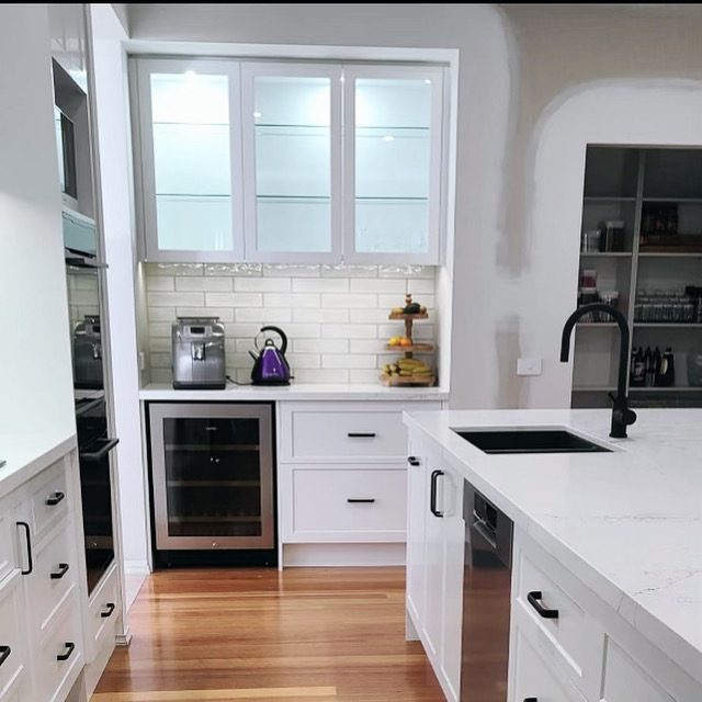 White shaker kitchen with island